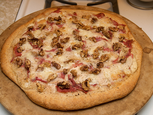 Prosciutto, walnut, blue cheese and pear pizza