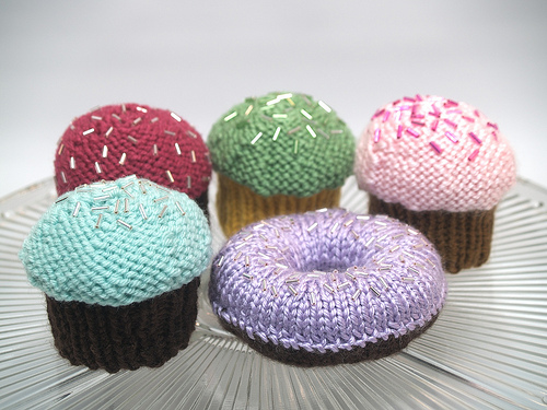 Cupcakes and a donut Cupcakes & Donuts