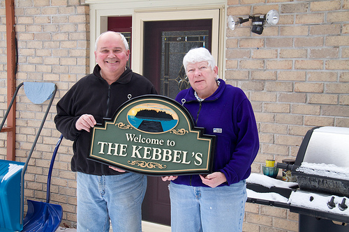 Mom & Dad Kebbel with their new sign The Sign