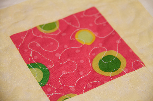little detail of my free motion quilting action Baby Quit top, quilted!