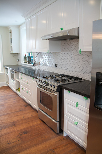 Back splash tile installed in the kitchen